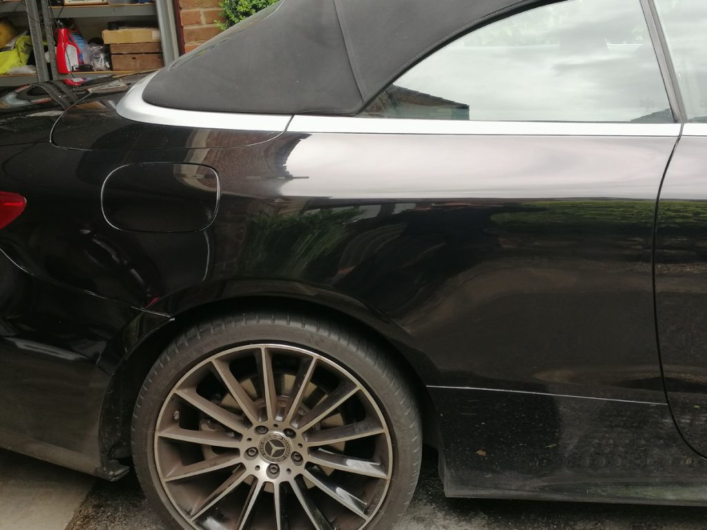 Repaired car by Scratch and Scuff